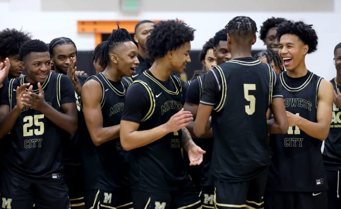 Midwest City celebrates after winning the Putnam City Invitational on Jan. 6, 2024.